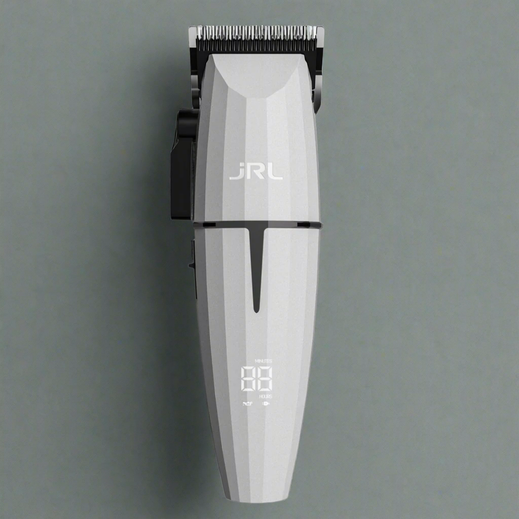 A GHOST Professional Cordless Hair Clipper on a sleek, modern background. The clipper features a metallic body with a textured grip for precision handling. Its sharp blades are positioned prominently at the top, and an LED indicator is visible on the handle, showing battery status. A clean, minimalistic design emphasizes its premium, professional build quality, making it ideal for both barbers and home users.